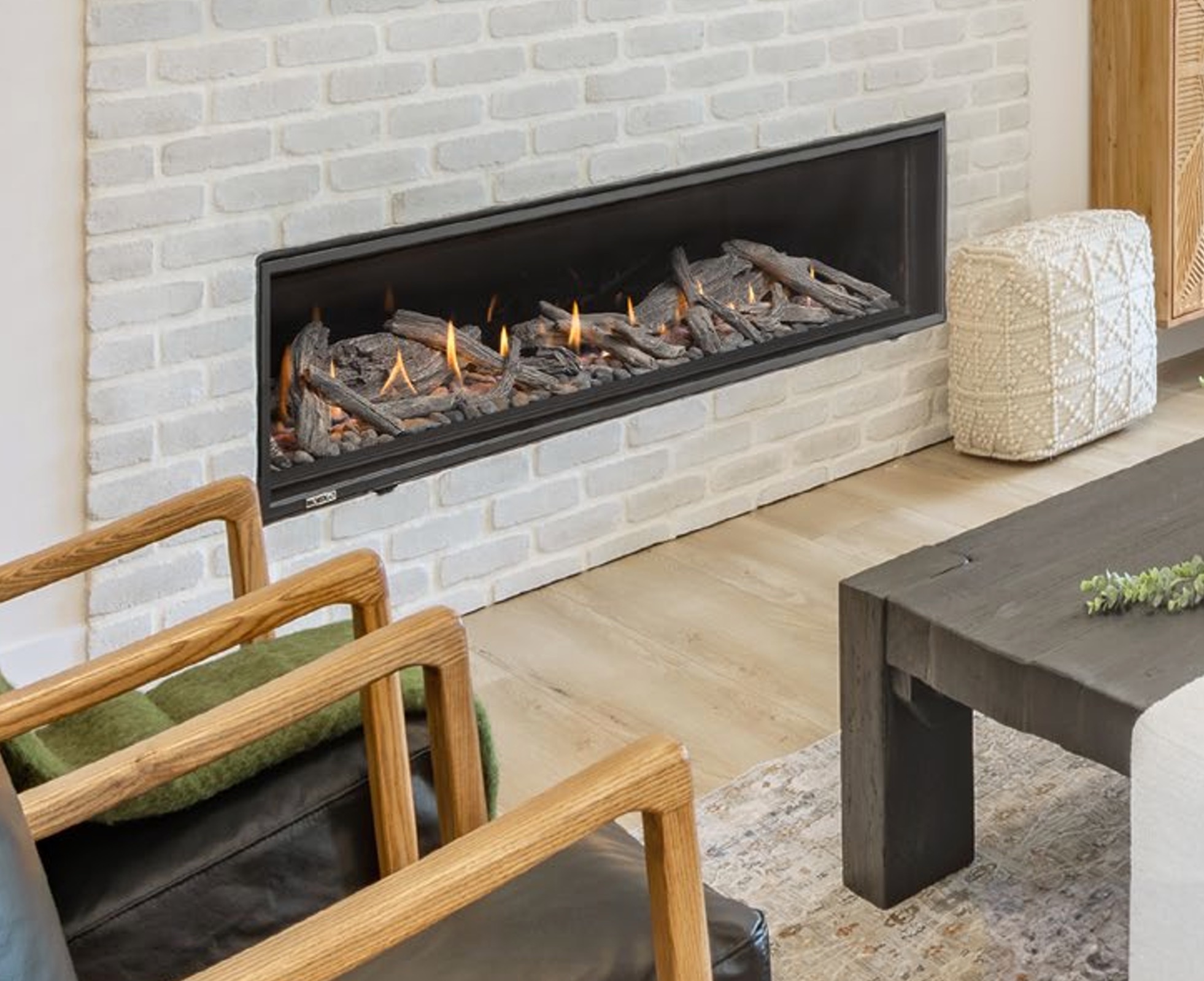 montigo linear fireplace on white brick wall 