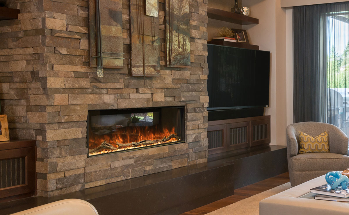 modern flames landscape pro multi 1 sided recessed install in a living room with brown stacked stone 